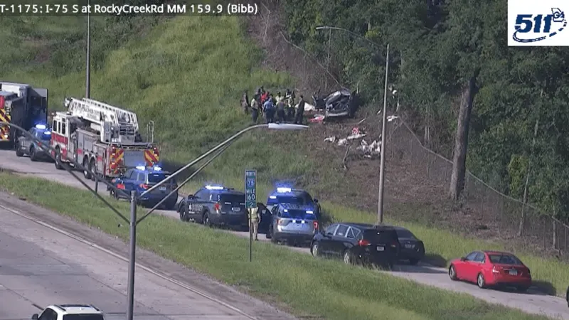 2 dead, child critically injured in accident along I-75 north in south Macon, coroner says