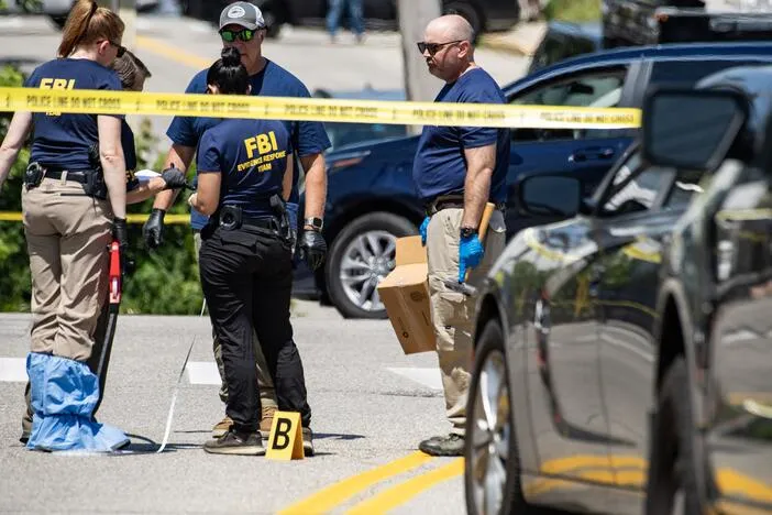 In the aftermath of deadly shootings, ICE pauses most traffic stops