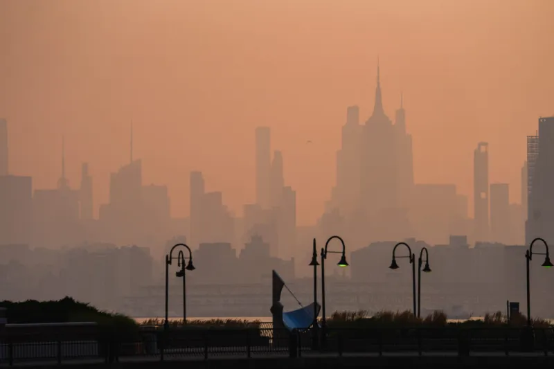 Thunderstorms will clear wildfire smoke from Northeast ahead of World Cup final, meteorologists say