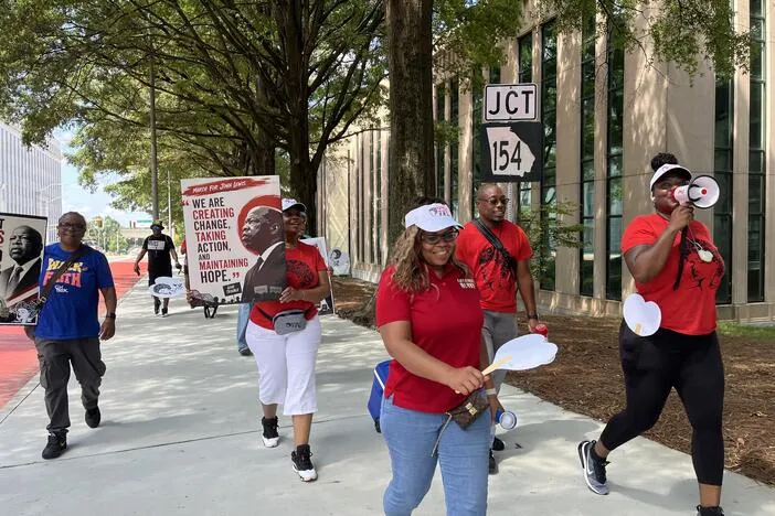 Atlanta criminal justice advocates host 'Good Trouble Lives On' march through downtown