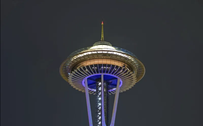 Seattle police are searching for two men who parachuted from the Space Needle