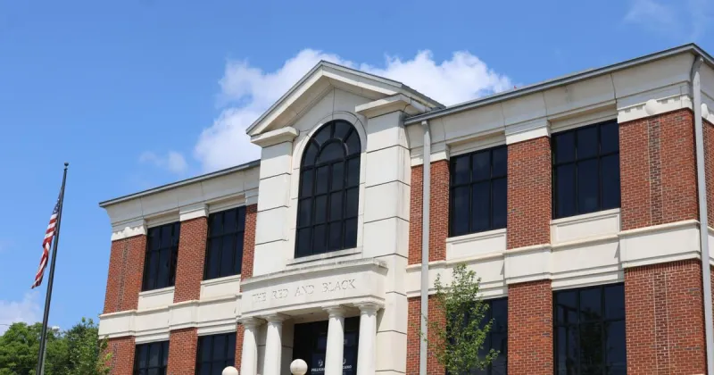 The Red & Black Announces Sale of Baxter Street Property to Strengthen Organization's Future