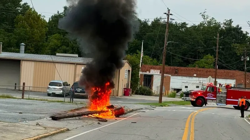 Car crash into light pole in Tennille causes small fire, nearby power outages