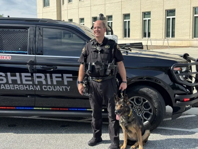 K9 Roxy fetches praise and donuts at her retirement party