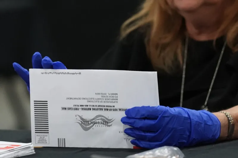 Why the rushed Postal Service plan for mail-in voting has states in a panic