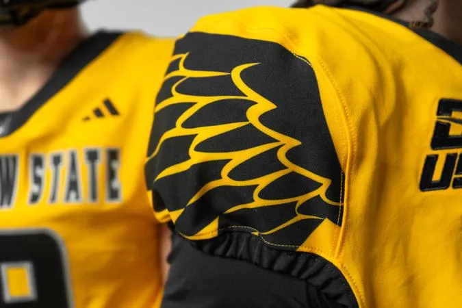 Football Unveils Gold Uniforms
