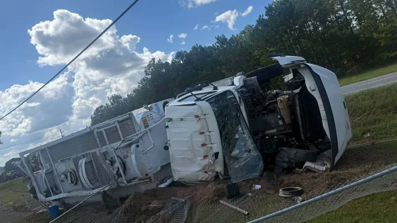 Hazmat leak shuts down Allen Memorial Drive at Hwy 49 after truck overturns