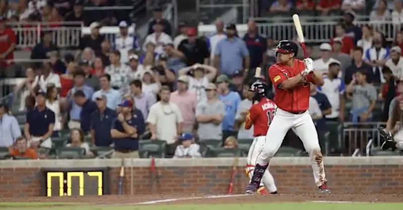 Braves outlast Phillies 6-5 in 11 innings in opener of key NL East series