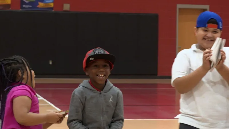 Mayor Miller's Literacy Alliance bring books to Bibb schools as reading drive continues