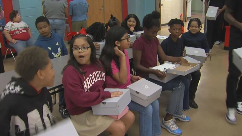Hope Kicks surprises Southfied Elementary fifth graders with free Nike athletic shoes
