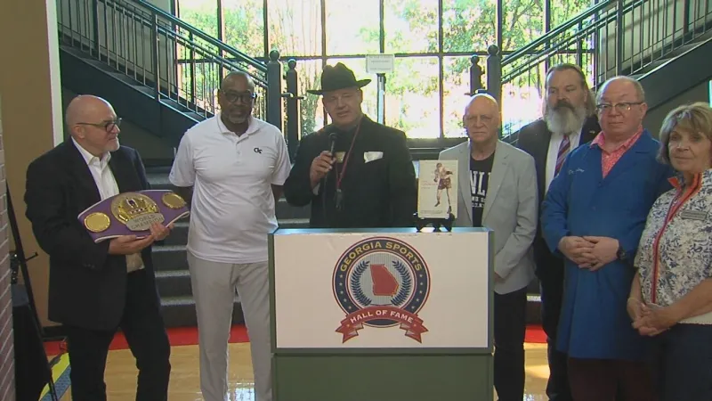 Commemorative belt honors boxer Young Stribling as Otis Nixon donates milestone cleats