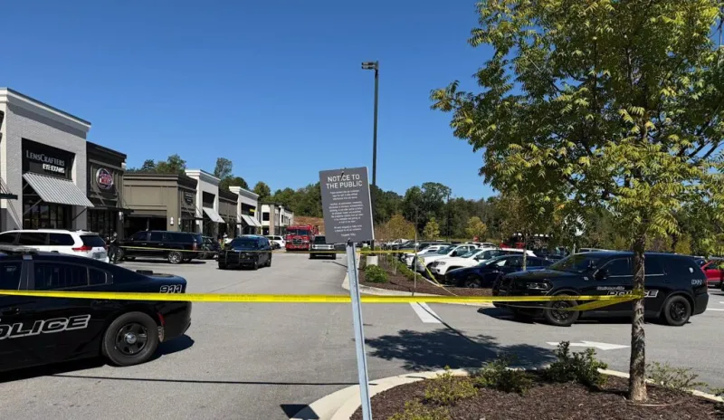Vehicle strikes child and building at Gainesville shopping center