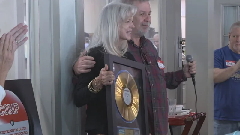 Donna Hall honored with RIAA gold record as Comp chapters gather in Macon for luncheon