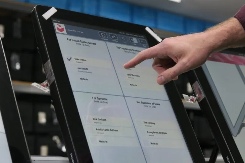 Election workers prepare for early voting as talk of DOJ 'intervention' leaves advocates unsettled