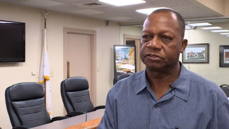 Mayor Eddie Daniels addresses residents at town hall following Vienna mass shooting