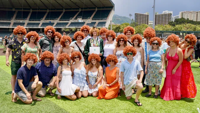 Family goes all-in on curls to celebrate UH Mnoa graduate