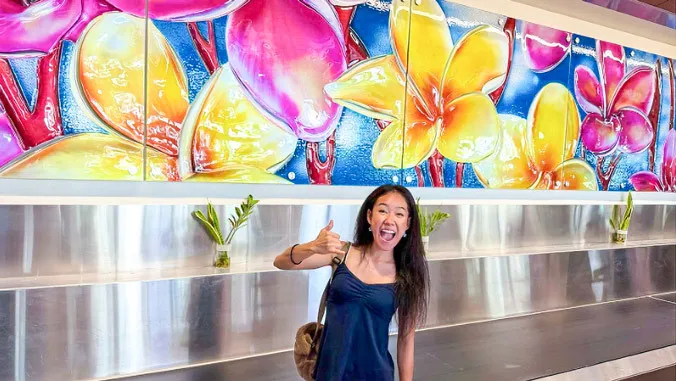 UH cheerleader's airport mural takes flight