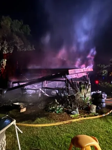 Haiku structure fire destroys carport, storage shed