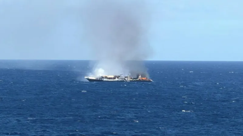 Crew rescued from burning vessel off Galapagos Islands with US Coast Guard coordination
