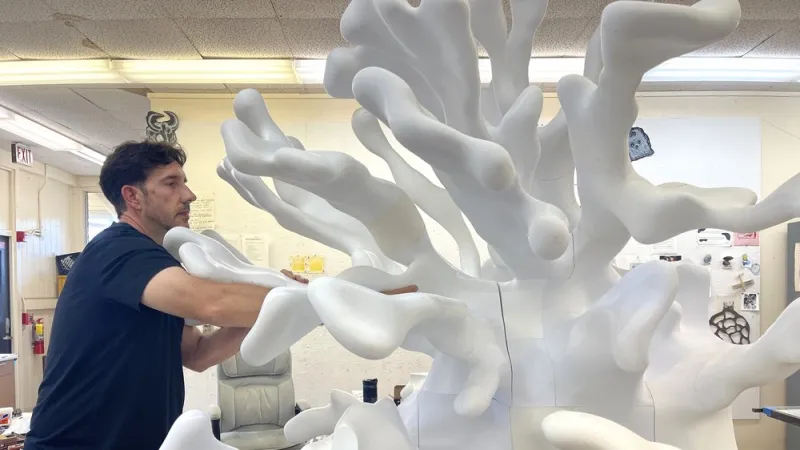 UH Hilo master printmaker Jon Goebel puts finishing touches on massive 3D coral display