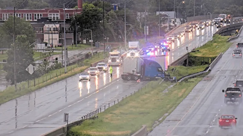 Jackknifed semi blocks I-380 traffic near S-curve in Cedar Rapids