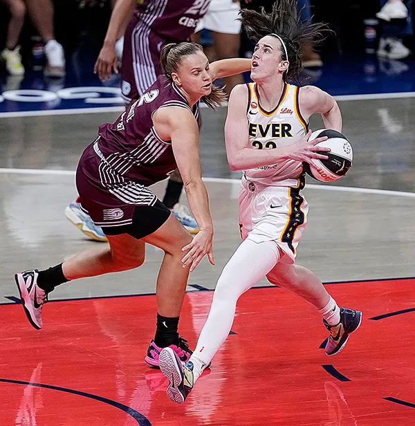 Clark's double-double helps Fever slow Tempo