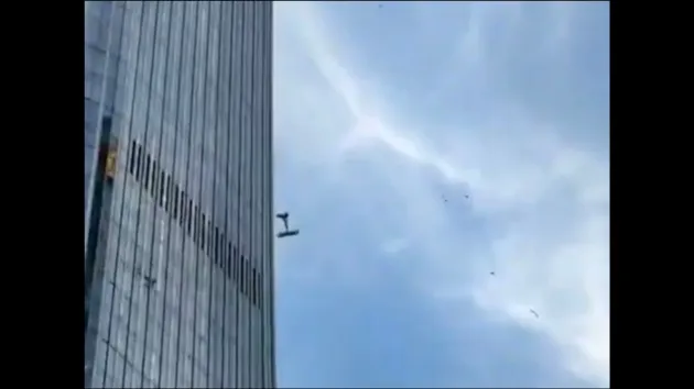 Small plane crashes into Beijing's tallest skyscraper