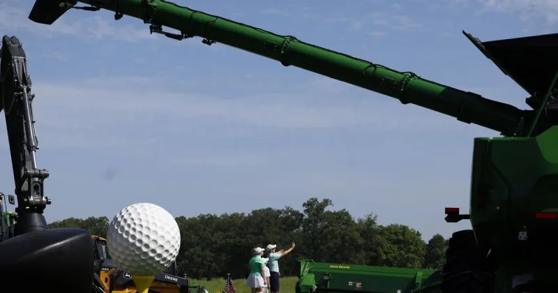 Fans at the John Deere Classic look for shade amid extreme heat warning