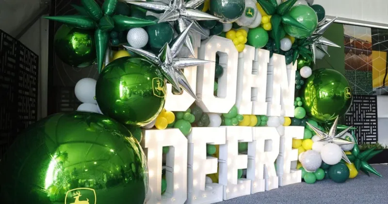 Coal Valley balloon artist inflates the decor at the John Deere Classic