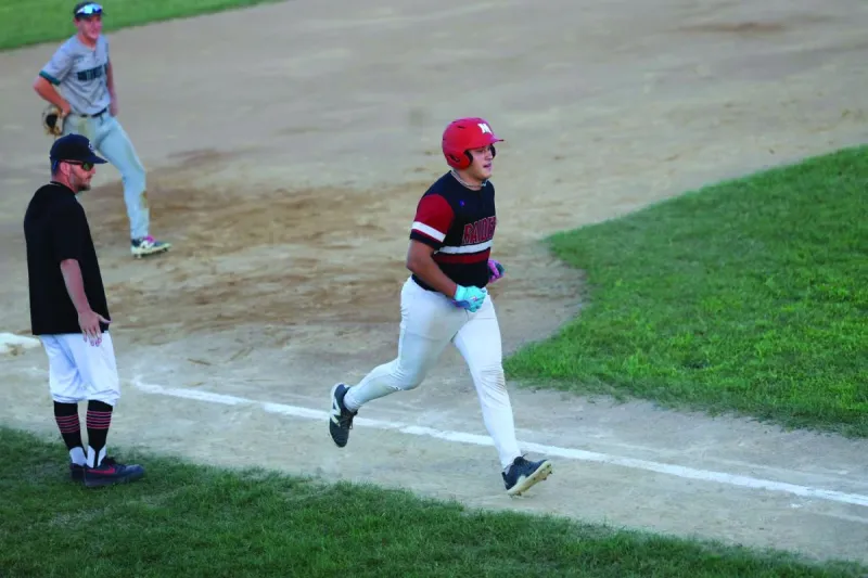 Graham homers twice in district win