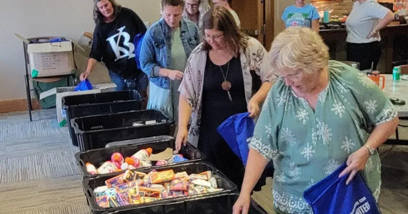 North Iowa volunteers pack nearly 300 survival kits for teachers