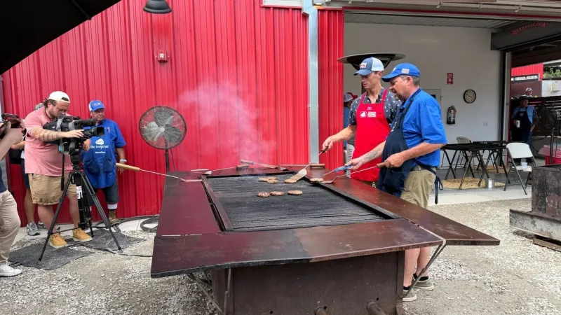 Sand talks agricultural trade as he takes on the pork tent at the Iowa State Fair