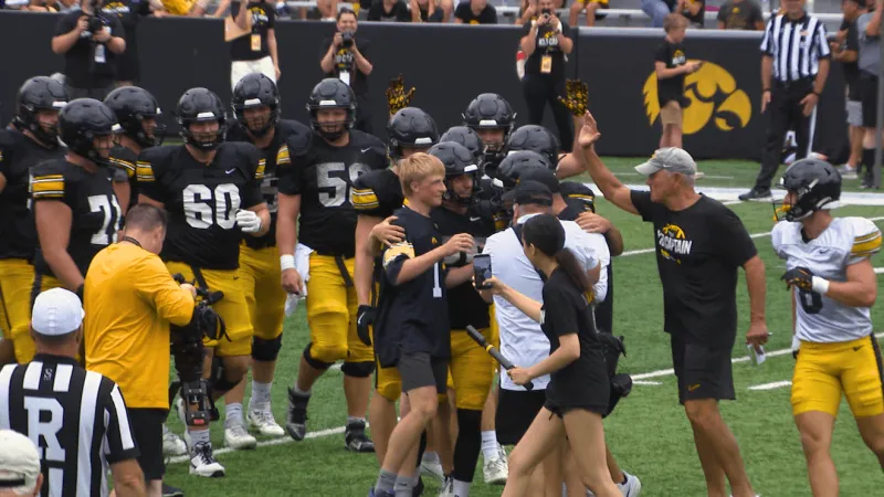 Kid Captain, Isaac Raue, nails a field goal at Kid's Day