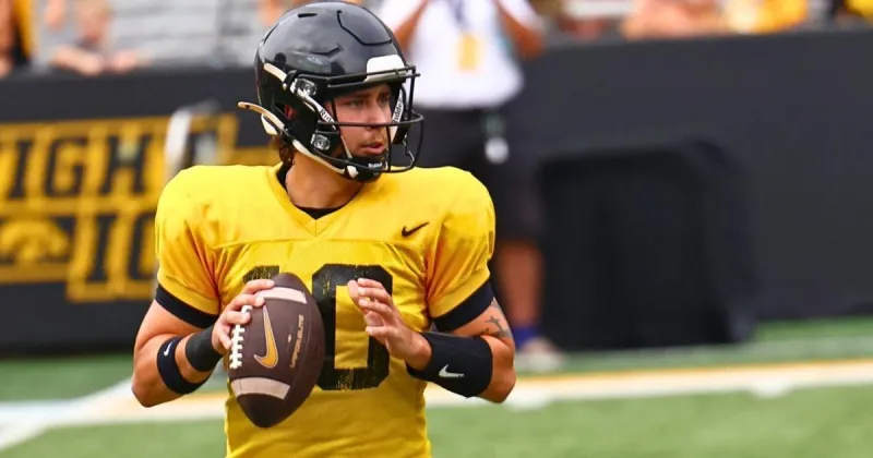 Kirk Ferentz: Iowa QB battle 'really dead even' with week to go before season opener