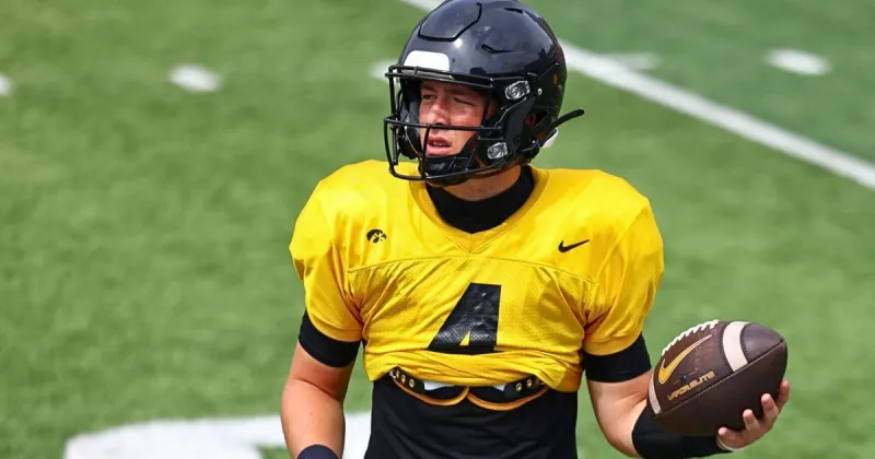 How did freshman quarterback Tradon Bessinger landed at Iowa and why is he turning heads