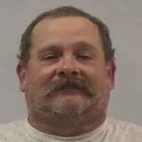 Man charged with making threat to Fremont-Mills School Board member