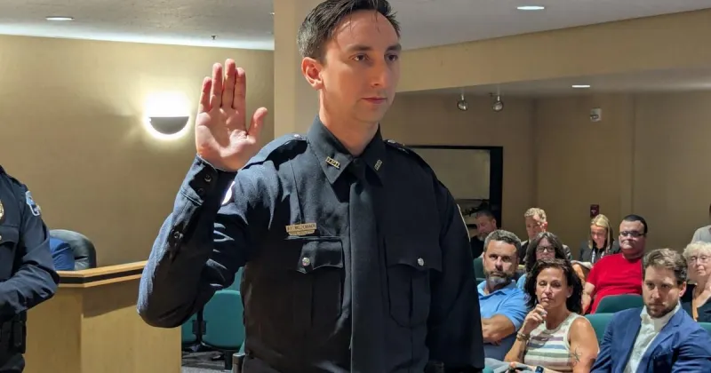 Davenport swears in three police officers