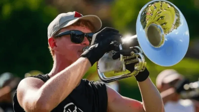 College marching bands send support to Hawkeye Marching Band after student's death