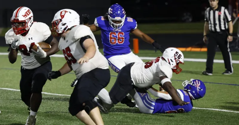 In front of last state champs, Blue Devils battle past rival West