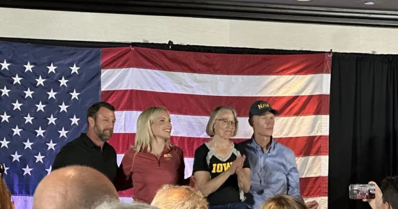 Iowa, national politicians court voters at CyHawk tailgates