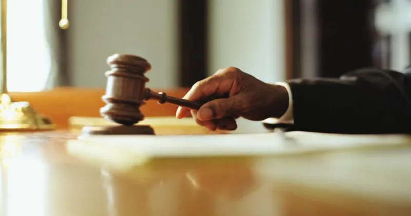 Fired police officer sues city over claims surrounding his private security work