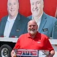 Hy-Vee honors former Madison Avenue store director with picture on semi-truck