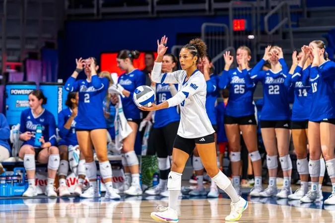 Bulldogs Sweep Racers for First Conference Win