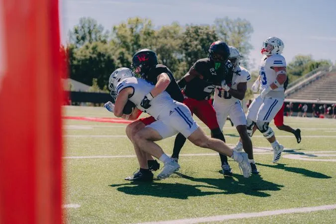 Walker Wins First Game as Bulldog Head Coach in 51-32 Romp Over Davidson