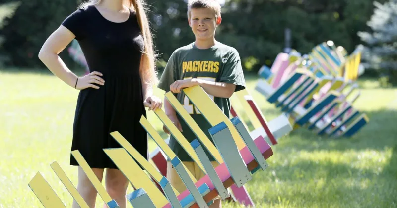 Youth Art Team selling wooden butterflies to support nonprofit