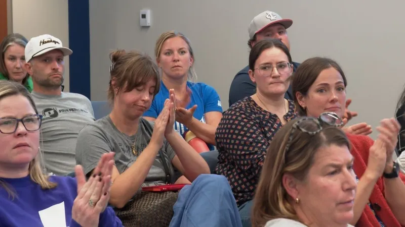 Iowa City parents urge district to find savings elsewhere as school closures loom