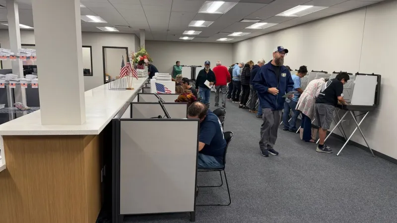 Thousands head to the polls on the first day of early voting in Iowa