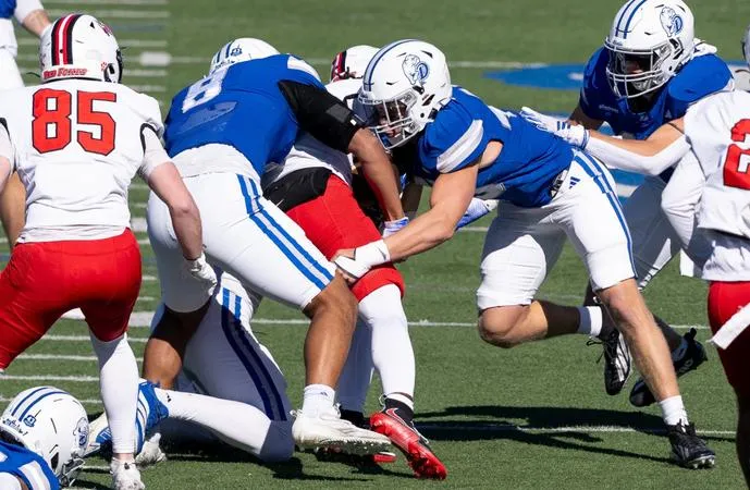 Football Loses Home Contest to Red Foxes as Late Drive Fall Short