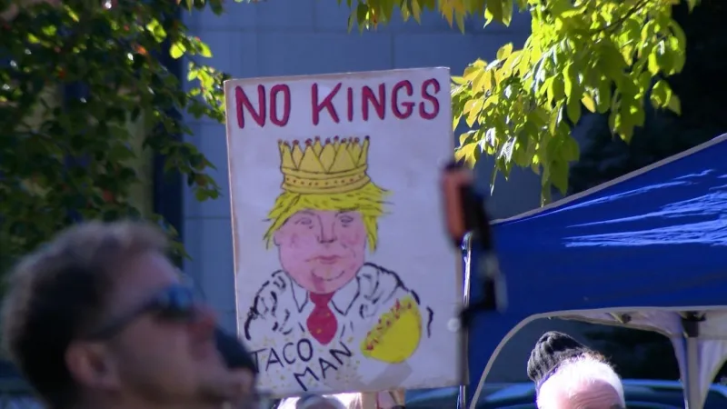 Hundreds gather in Dubuque for No Kings rally ahead of president's Iowa visit