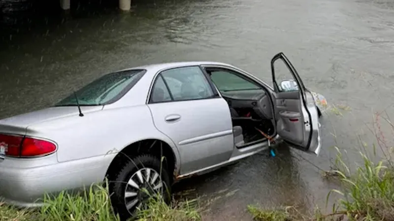 Driver safe after vehicle slides into canal near Iona Road